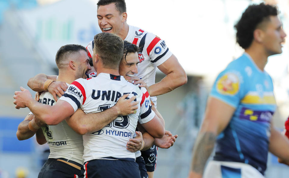 James Tedesco, pictured here celebrating a try with Roosters teammates.