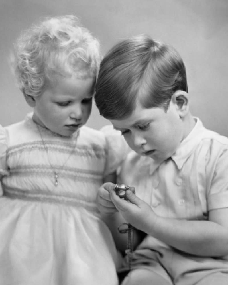 King Charles shows Princess Anne his pocket watch