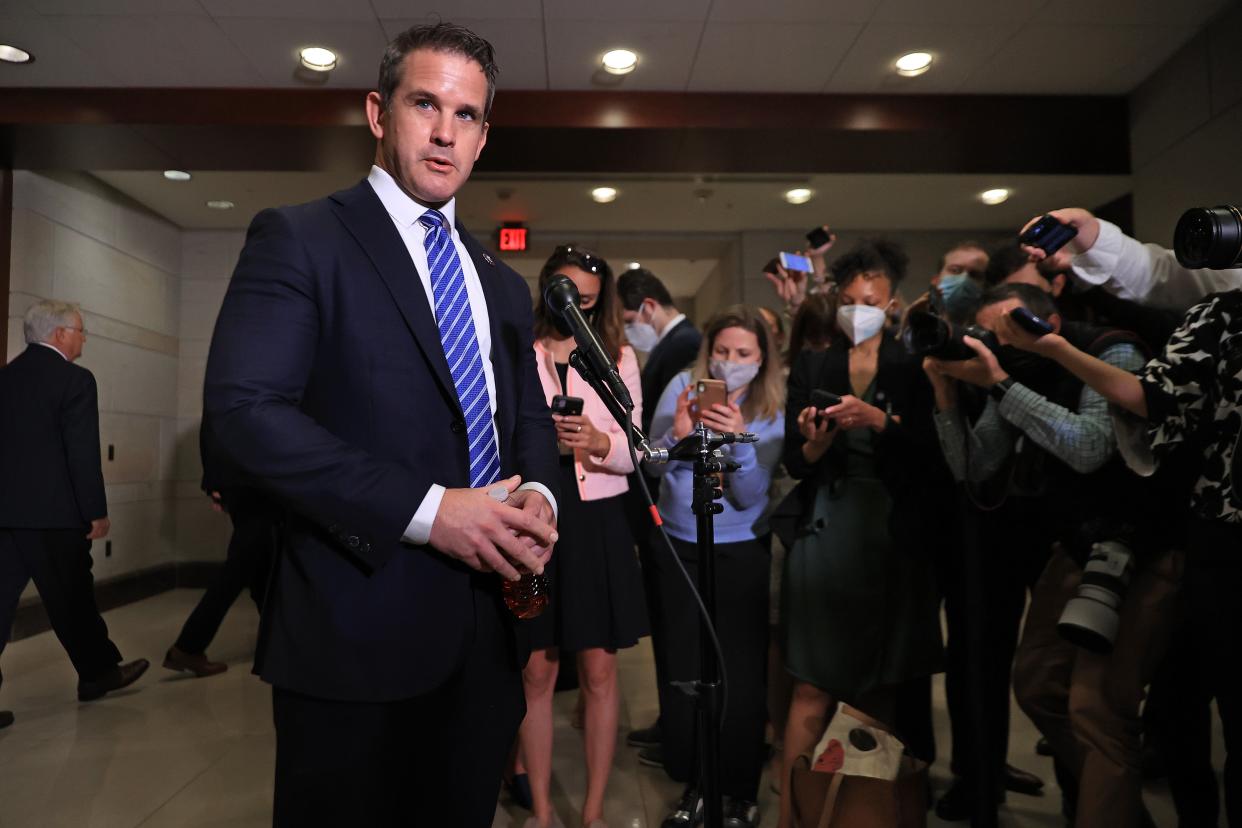 Congressman Adam Kinzinger talks to reporters in the Capitol. (Getty Images)