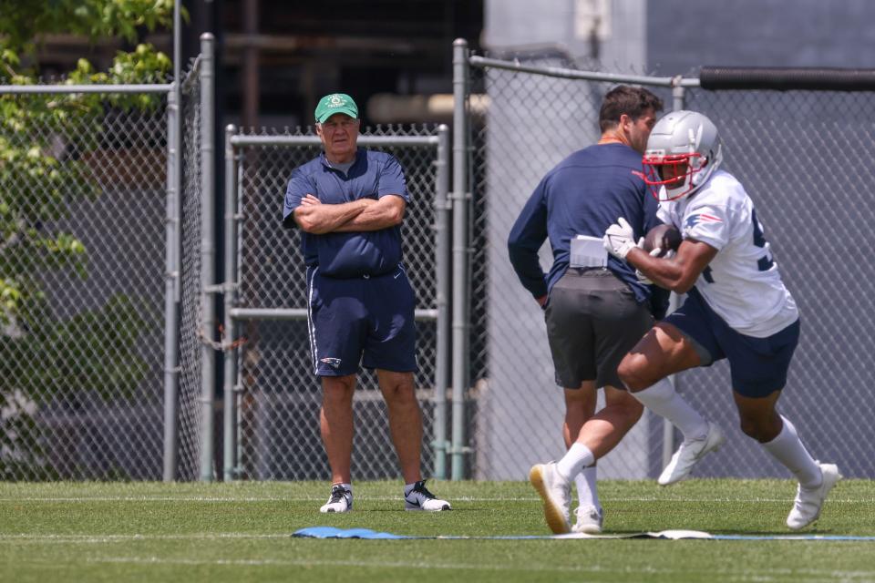 Patriots head coach Bill Belichick watches a drill during minicamp on June 8 at Gillette Stadium.