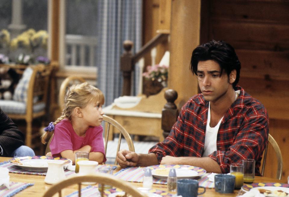 Mary Kate Olsen and John Stamos in the original series.&nbsp; (Photo: ABC Photo Archives via Getty Images)