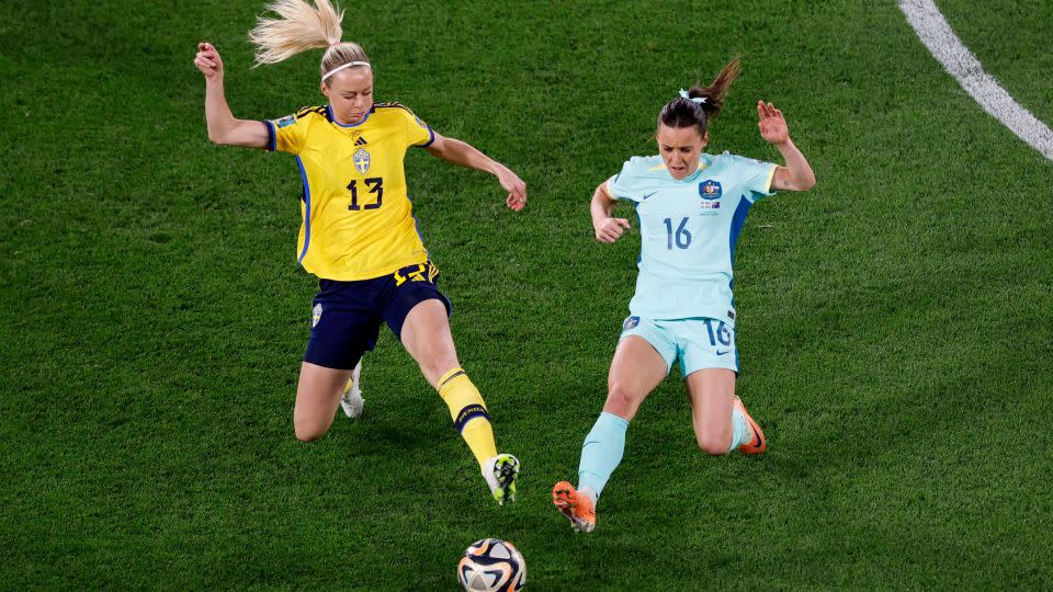 Sweden's Amanda Ilestedt fights for the ball with Australia's Hayley Raso. - Amanda Perobelli/Reuters