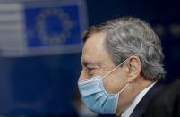 Italy's Prime Minister Mario Draghi leaves after a first day of meetings at an EU summit in Brussels, Friday, Oct. 22, 2021. (Olivier Hoslet, Pool Photo via AP)