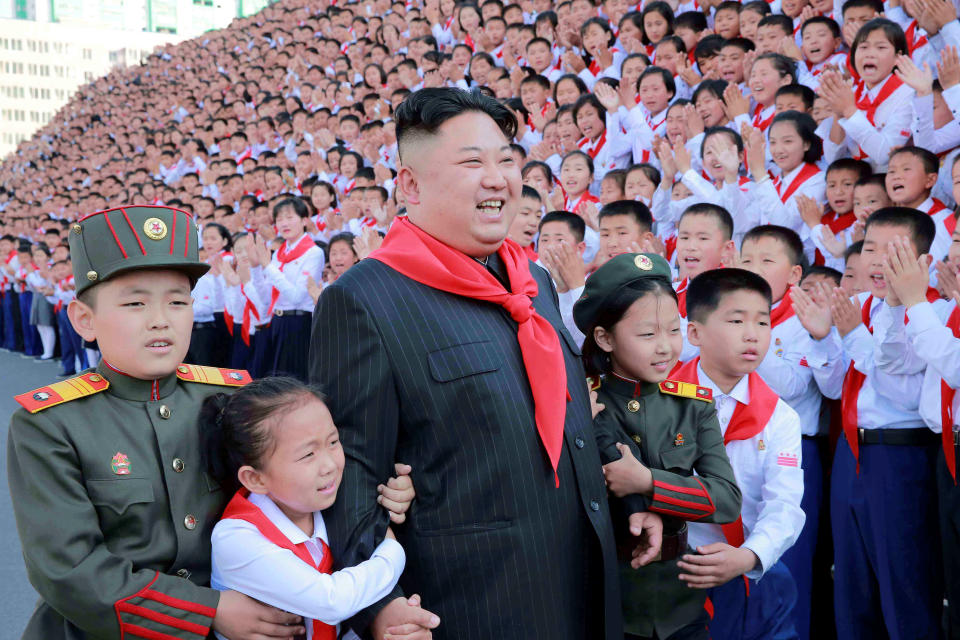 North Korean leader Kim Jong Un poses with participants during the 8th Congress of the Korean Children's Union (KCU) in this undated photo released by North Korea's Korean Central News Agency (KCNA) in Pyongyang, North Korea June 8, 2017. KCNA via REUTERS   ATTENTION EDITORS - THIS IMAGE WAS PROVIDED BY A THIRD PARTY. REUTERS IS UNABLE TO INDEPENDENTLY VERIFY THIS IMAGE. EDITORIAL USE ONLY. NO THIRD PARTY SALES. NOT FOR USE BY REUTERS THIRD PARTY DISTRIBUTORS. SOUTH KOREA OUT. NO COMMERCIAL OR EDITORIAL SALES IN SOUTH KOREA.