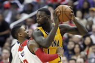 Indiana Pacers guard Lance Stephenson (1) looks for a way around Washington Wizards guard Bradley Beal during the first half of Game 3 of an Eastern Conference semifinal NBA basketball playoff game in Washington, Friday, May 9, 2014. (AP Photo/Alex Brandon)