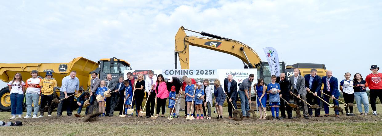 Officials break ground on the Scheels Sports Park at Legacy Pointe on South MacArthur Blvd., Wednesday, Sept. 20, 2023.