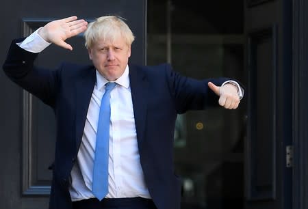 Boris Johnson arrives at the Conservative Party headquarters in London