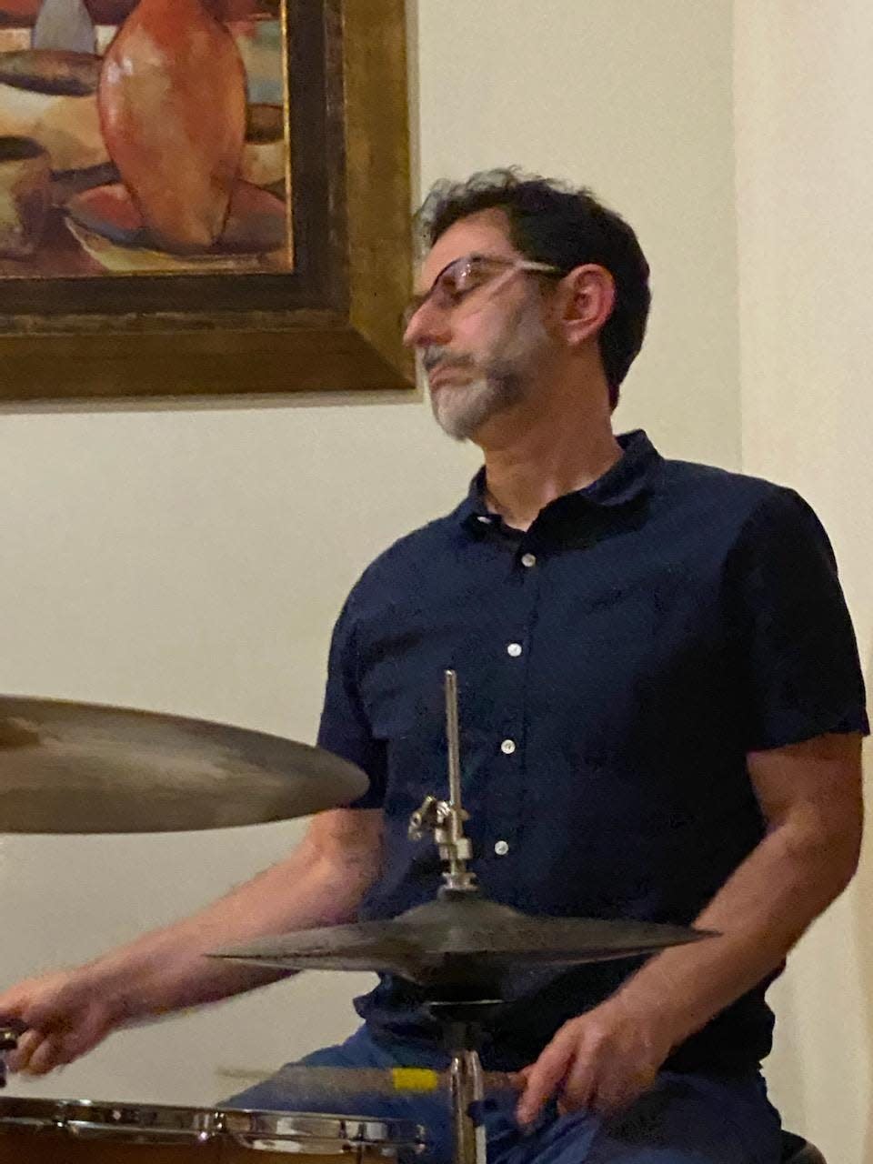 Michael Bakan performs on drums with Bill Peterson on piano, Brian Hall on bass at Blue Tavern on Saturday, March 23, 2024.