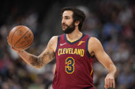 Cleveland Cavaliers guard Ricky Rubio looks to pass the ball against the Denver Nuggets in the first half of an NBA basketball game Monday, Oct. 25, 2021, in Denver. (AP Photo/David Zalubowski)