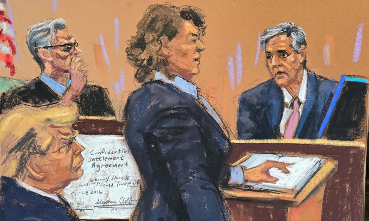 <span>Michael Cohen is questioned by prosecutor Susan Hoffinger before Justice Juan Merchan as Donald Trump watches on 13 May, in this courtroom sketch.</span><span>Photograph: Jane Rosenberg/Reuters</span>