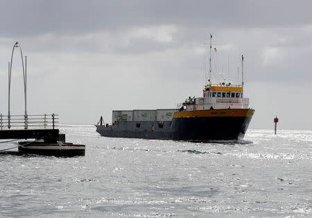 The Midnight Stone ship carrying containers with humanitarian aid for Venezuela enters the harbour in the port of Willemstad on the island of Curacao, February 24, 2019. REUTERS/Henry Romero