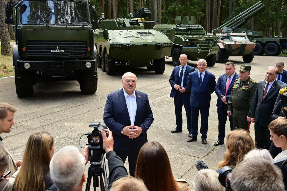 In this handout photo released by Belarusian Presidential Press Office, Belarusian President Alexander Lukashenko talks with the media during his visit to the missile production enterprise in Minsk region, Belarus, Tuesday, June 13, 2023. (Belarusian Presidential Press Office via AP)