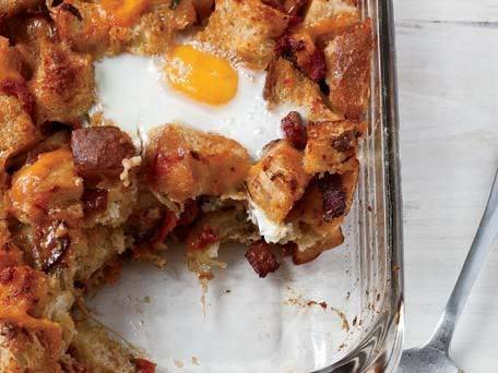 <strong>Get the <a href="http://www.huffingtonpost.com/2011/10/27/bacon-tomato-and-cheddar_n_1059614.html">Bacon, Tomato and Cheddar Breakfast Bake with Eggs</a> recipe</strong>