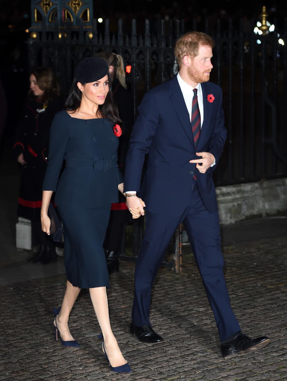 Bespoke pieces are a major part of Markle's maternity outfits, like the custom skirt suit and pillbox hat for Remembrance Day services at Westminster Abbey, designed by Prada.