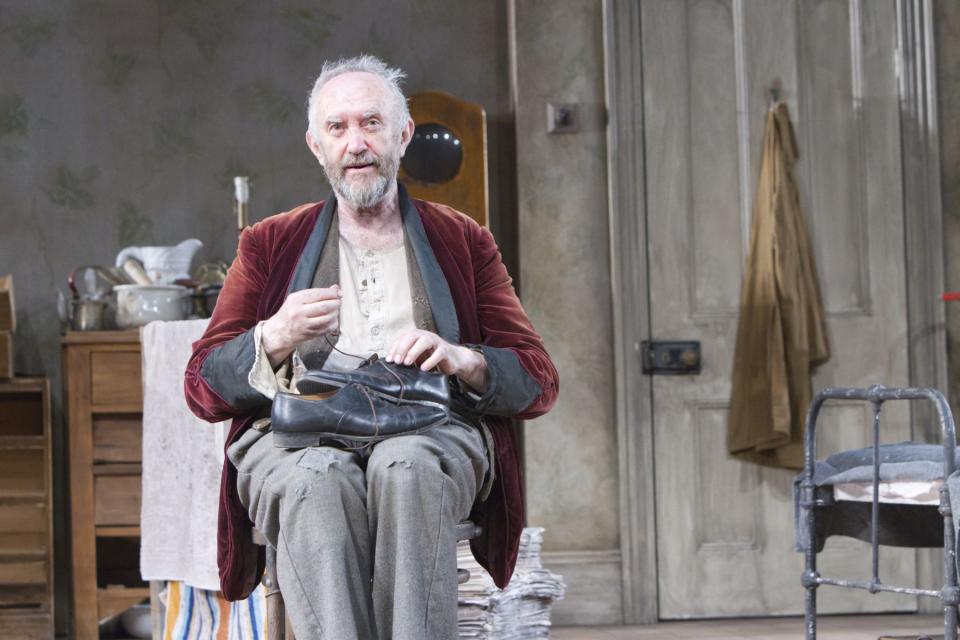 In this undated image released by the Brooklyn Academy of Music, actor Jonathan Pryce is shown during a performance of "The Caretaker," in New York. (AP Photo/BAM, Shane Reid)