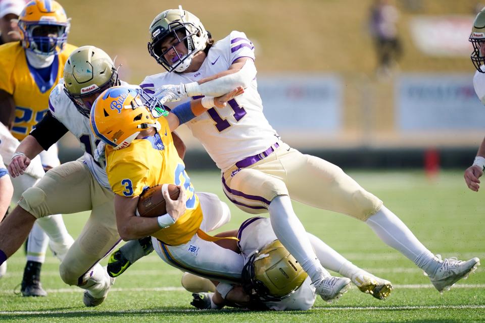 CPA’s Crews Law (11) pushes down Boyd Buchanan's Sebastian Jones (3) during the fourth quarter of a Division II-AA championship game at Finley Stadium in Chattanooga, Tenn., Thursday, Nov. 30, 2023.