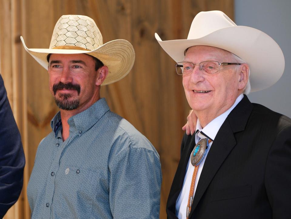 Former Professional Bull Riders world champion Kody Lostroh, left, and Oklahoma businessman Bob Funk Sr., right, smile during a press conference Thursday announcing the PBR Hall of Fame inaugural class at the organization's soon-to-be-launched Hall of Fame at the National Cowboy & Western Heritage Museum in Oklahoma City.