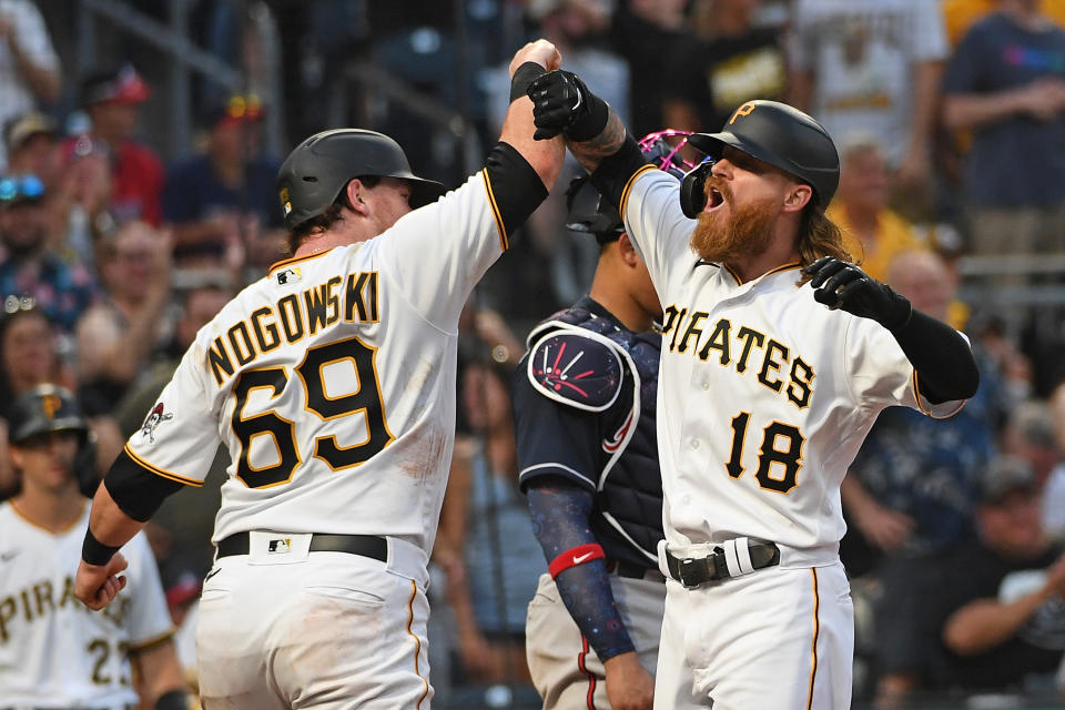 PITTSBURGH, PA - JULY 05: Ben Gamel #18 of the Pittsburgh Pirates celebrates with John Nogowski #69 after hitting a two run home run in the fourth inning during the game against the Atlanta Braves at PNC Park on July 5, 2021 in Pittsburgh, Pennsylvania. (Photo by Justin Berl/Getty Images)