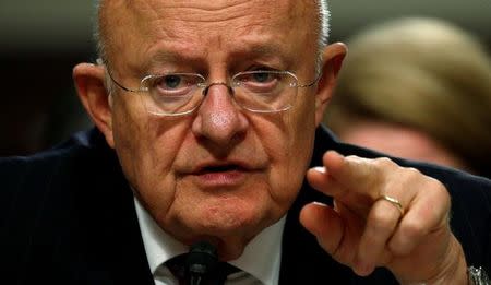 FILE PHOTO: James Clapper testifies before a Senate Armed Services Committee hearing on foreign cyber threats, on Capitol Hill in Washington, U.S., January 5, 2017. REUTERS/Kevin Lamarque/File Photo