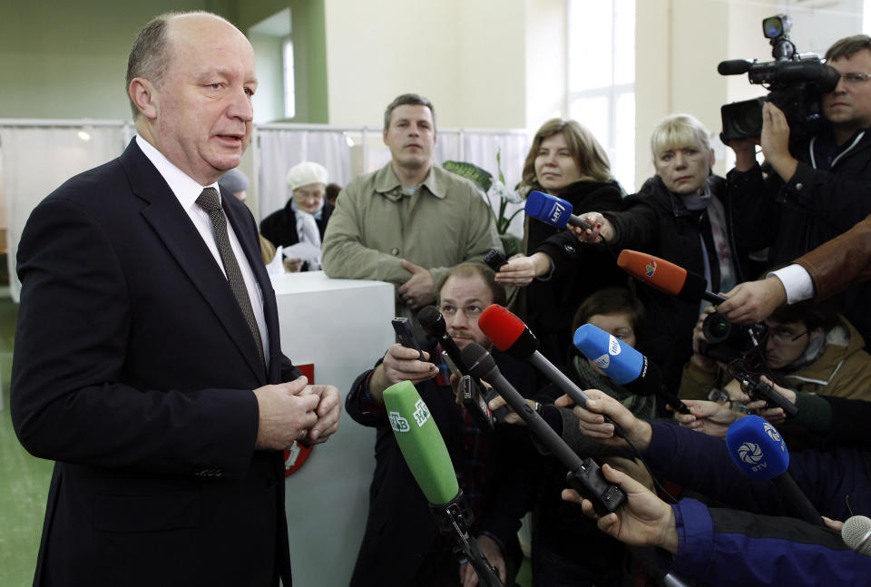 Lithuania's Prime Minister and Homeland Union leader Andrius Kubilius speaks to the media at a polling station in Vilnius, Lithuania, Sunday, Oct. 14, 2012. Lithuanians are expected to deal a double-blow to the incumbent conservative government in national elections Sunday by handing a victory to opposition leftists and populists and saying 'no' to a new nuclear power plant that supporters claim would boost the country's energy independence. (AP Photo/Mindaugas Kulbis)