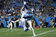 Carolina Panthers cornerback CJ Henderson breaks up a pass intended for Detroit Lions wide receiver Chase Cota during the first half of a preseason NFL football game Friday, Aug. 25, 2023, in Charlotte, N.C. (AP Photo/Erik Verduzco)