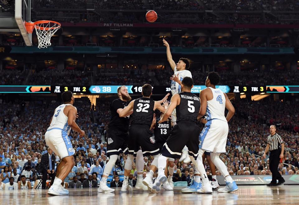 <p>North Carolina Tar Heels forward Justin Jackson (44) shoots the ball against Gonzaga Bulldogs forward Zach Collins (32) during the second half in the championship game of the 2017 NCAA Men’s Final Four at University of Phoenix Stadium. Mandatory Credit: Robert Deutsch-USA TODAY Sports </p>