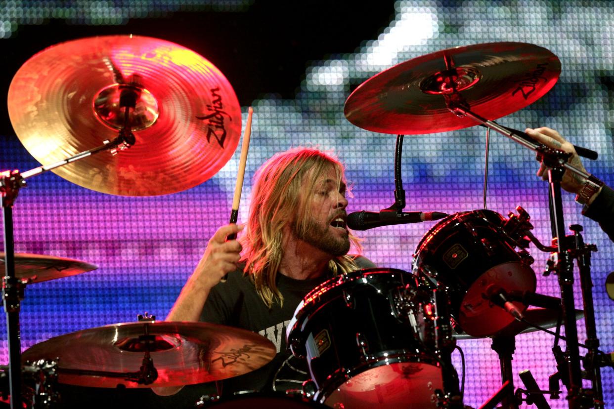 Taylor Hawkins performs during a Foo Fighters gig (Yui Mok/PA) (PA Wire)