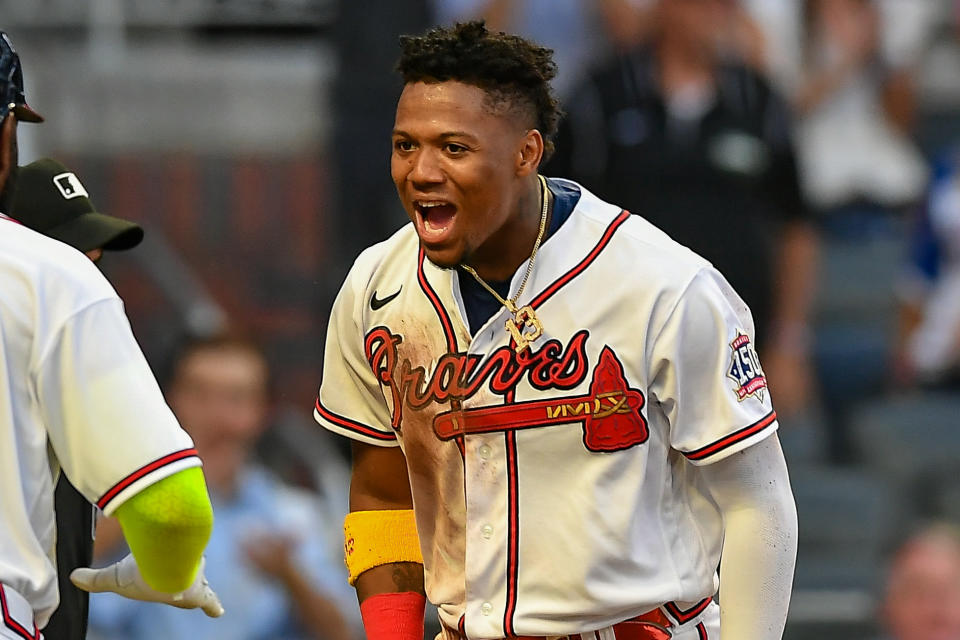 ATLANTA, GA  APRIL 28:  Atlanta right fielder Ronald Acuna Jr. (13) reacts after scoring a run during the MLB game between the Chicago Cubs and the Atlanta Braves on April 28th, 2021 at Truist Park in Atlanta, GA. (Photo by Rich von Biberstein/Icon Sportswire via Getty Images)