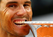 FILE PHOTO: Spain's Rafael Nadal celebrates with the Italian Open trophy after winning the final against Germany's Alexander Zverev REUTERS/Tony Gentile