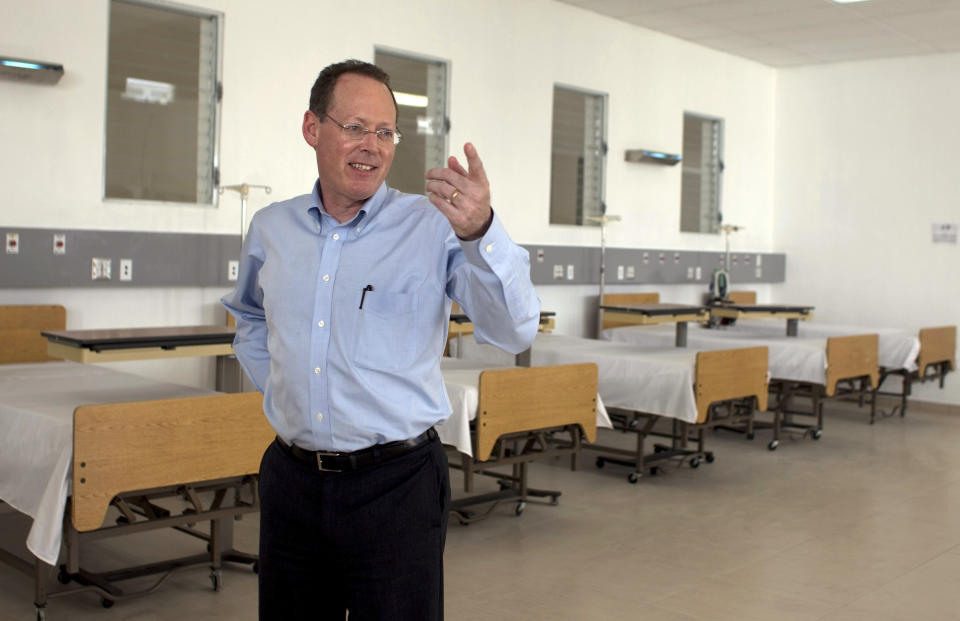 In this picture taken Jan. 10, 2012, Partners in Health's co-founder, Dr. Paul Farmer, gestures during the inauguration of national referral and teaching hospital in Mirebalais, 30 miles (48 kilometers) north of Port-au-Prince, Haiti. Dr. Paul Farmer, a physician, humanitarian and author renowned for providing health care to millions of impoverished people, has died. He was 62. Farmer co-founded the global nonprofit Partners in Health, which confirmed his death Monday, Feb. 21, 2022. (AP Photo/Dieu Nalio Chery, file)