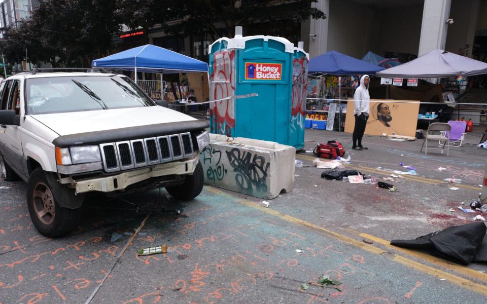 A general view of the scene of a fatal shooting, in which at least one person was killed after a car rammed a concrete barricade - STEPHEN BRASHEAR/EPA-EFE/Shutterstock/Shutterstock