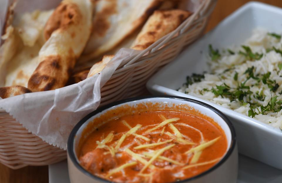 The restaurant Garlic & Ginger: Fine Indian Cuisine by Chef AK recently opened in Spartanburg. This is a dish of: Chicken Tikka Masala with Basmati Rice and naan.
(Credit: ALEX HICKS JR./SPARTANBURG HERALD-JOURNAL)