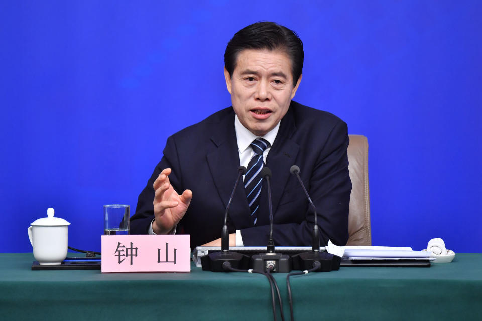 <p> In this photo released by China's Xinhua News Agency, Chinese Minister of Commerce Zhong Shan speaks at a press conference in Beijing, Sunday, March 11, 2018. China says it will not initiate a "disastrous" trade war with the United States, but is vowing to defend its national interests in the face of growing American protectionism. (Li Xin/Xinhua via AP) </p>