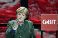 German Chancellor Angela Merkel speaks during the opening ceremony of the CeBit computer fair, which will open its doors to the public on March 20, at the fairground in Hanover, Germany, March 19, 2017. REUTERS/Fabian Bimmer