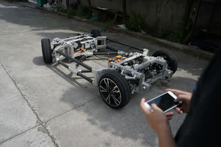 A electric car is seen in a workshop of Automagic in Hangzhou, Zhejiang province, China September 26, 2018. Picture taken September 26, 2018. REUTERS/Aly Song