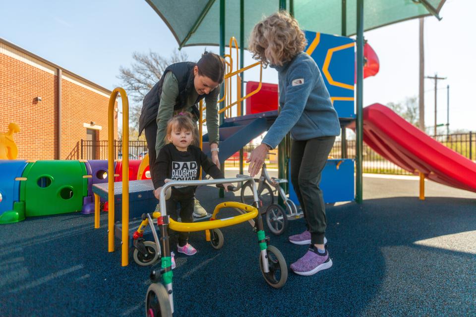 New playgrounds at several Topeka USD 501 elementary schools will feature flat, but soft, playground surfaces to make it easier for students with mobility impairments, like preschooler Amira Payne, to get around and play with friends.