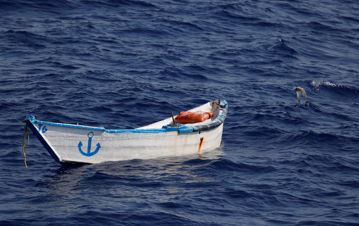An abandoned wooden boat found by a German charity migrant rescue ship off the North African coast (REUTERS)