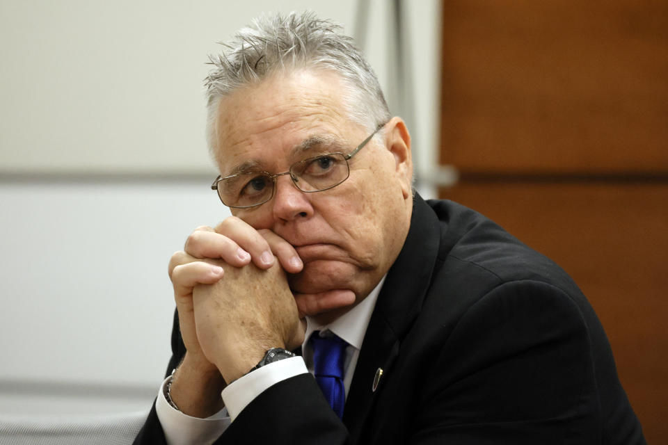 Former MSD School Resource Officer Scot Peterson sits at the defense table during closing arguments in his trial, Monday, June 26, 2023, at the Broward County Courthouse in Fort Lauderdale, Fla. Peterson is accused of failing to confront the shooter who murdered 14 students and three staff members at a Parkland high school five years ago. (Amy Beth Bennett/South Florida Sun-Sentinel via AP, Pool)