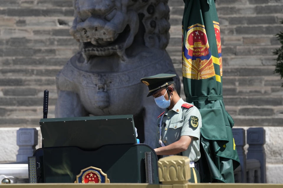 A Chinese paramilitary policeman guards on duty near Tiananmen Square on the 32nd anniversary of a deadly crackdown on pro-democracy protests in Beijing on Friday, June 4, 2021. Commemorations of the June 4, 1989 crackdown on student-led pro-democracy protests centered on Beijing's Tiananmen Square were especially muted Friday amid pandemic control restrictions and increasing political repression. (AP Photo/Ng Han Guan)