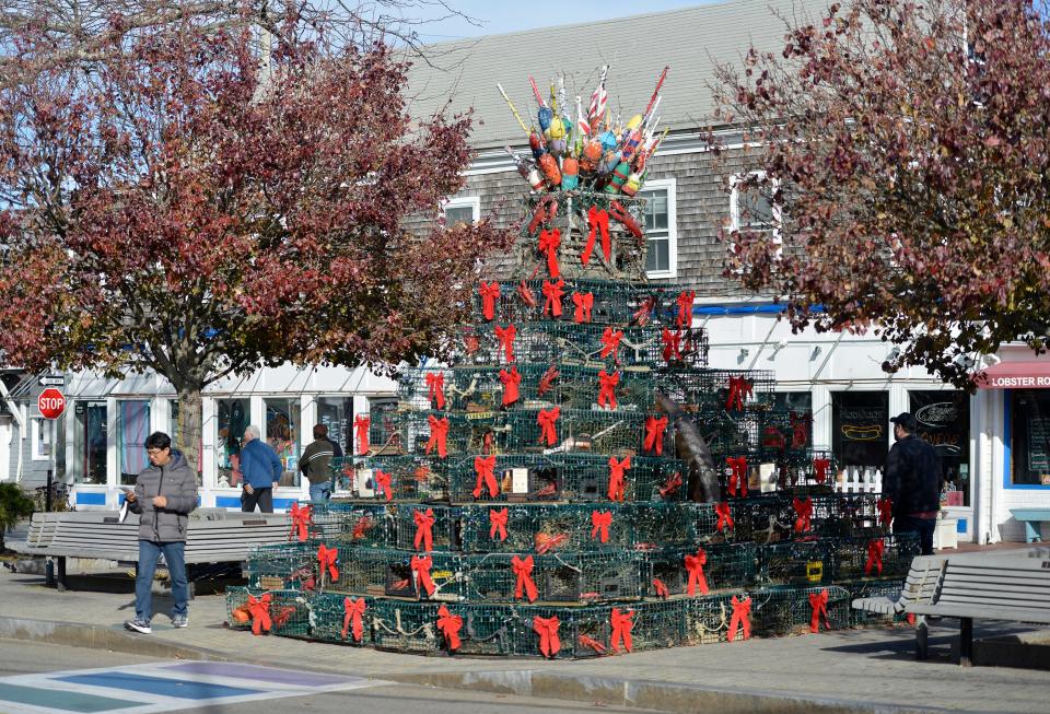 The Lobster Pot Tree in Provincetown's Lopes Square was created in 2004 by Julian Popko to highlight the lobstering community. Popko died in 2017 and his family, along with volunteers, have continue to build the tree, which includes lobster traps, painted buoys, red bows and thousands of lights. The official lighting was Nov. 25 this year.