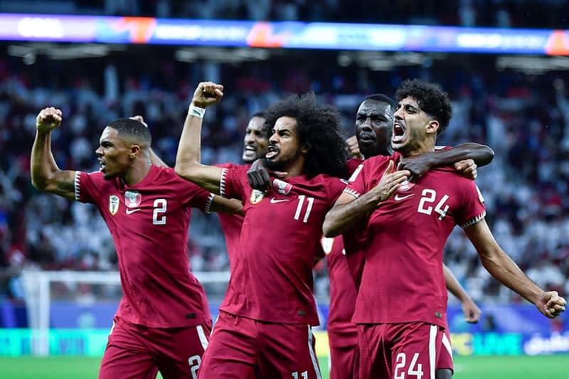 Qatar players celebrate a goal with fans during the AFC Asian Cup Semi Final soccer match between Qatar and Iran at Al Thumama Stadium. Mosa Alkathami/SPA/dpa