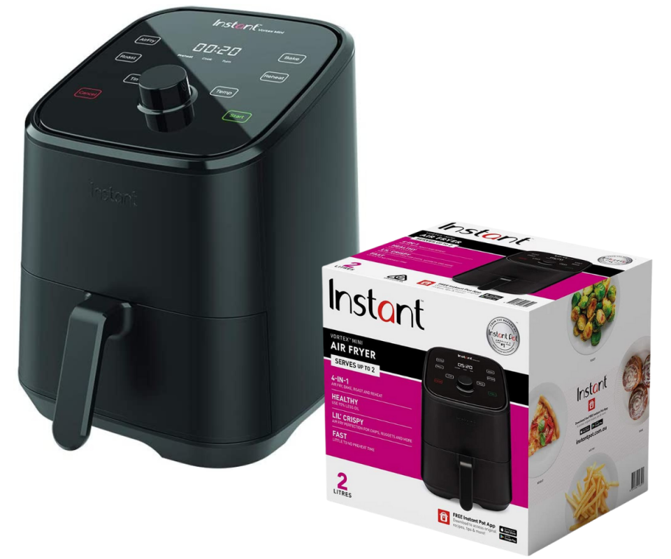 The Instant Pot Air Fryer in black sits on an angle against a white background with the packaging box in front in white and purple on the bottom right.