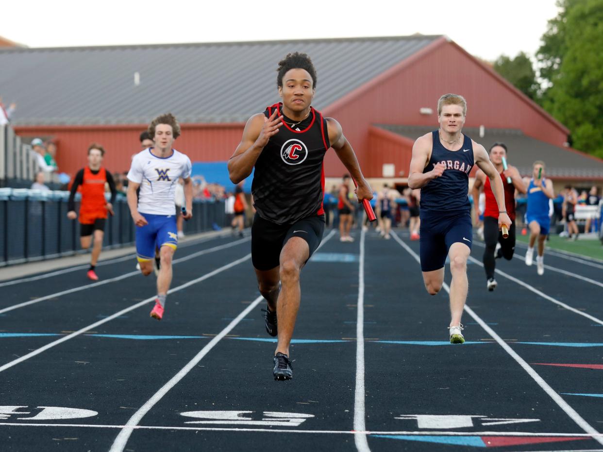 Coshocton senior Israel Rice spints to a win in the 4x100 relay during the Musknigum Valley League Track and Field Meet on Friday at Maysville HIgh School.