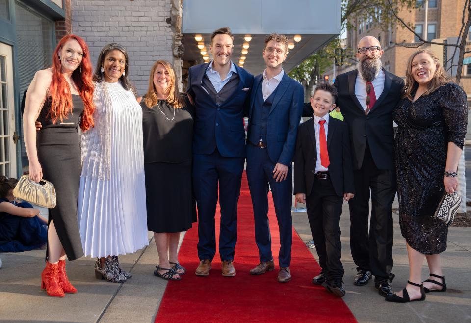 Film directors and cast from left, Courtney Crowder, Dayna Chandler, Torie Giffin, Ian Zahren, Andrew Boddicker, Liam Lineberry, Adam Lineberry, and Kelsey Kremer stand for a photo outside the Varsity Cinema before the premiere of "Shift: The RAGBRAI Documentary" Thursday, May 4, 2023.