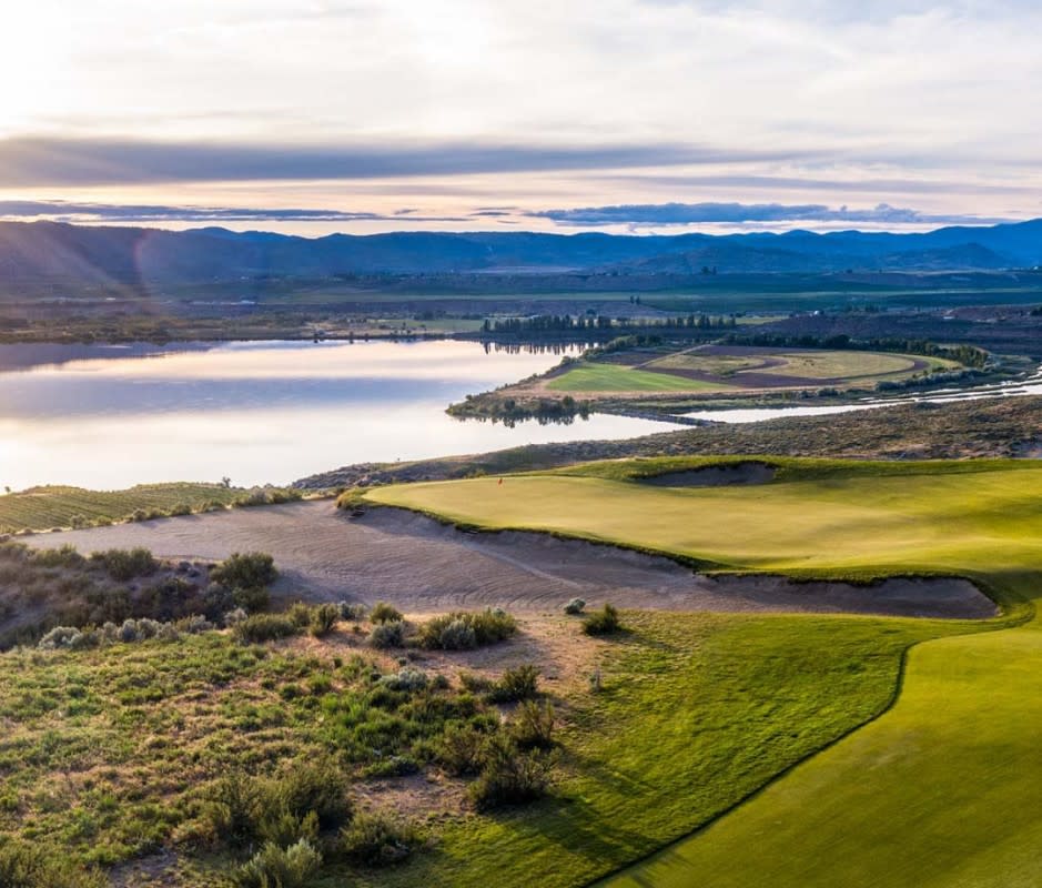 <p>When Scottish architect David McLay Kidd, of Bandon Dunes fame, was given the opportunity to build a course in the middle of cherry-and-apple-orchard country, he had one word on his mind: fun. That’s the name of the game at this course on the bluffs of the Columbia River in the high desert of eastern Washington. It boasts wide, rambling fairways that funnel towards safety, not penalty, and multiple short par-4s and reachable par-5s. Post-round, grab your flatstick and soak up mountain scenery on its wild 100,000-square-foot putting course.</p>