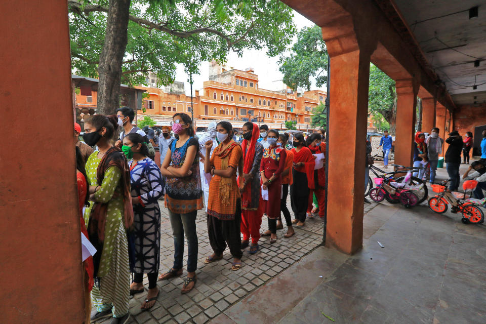 Students Crowd Outside An Examination Centre In Jaipur