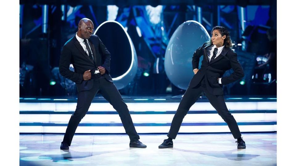 Eddie Kadi and Karen Hauer dancing in movie week