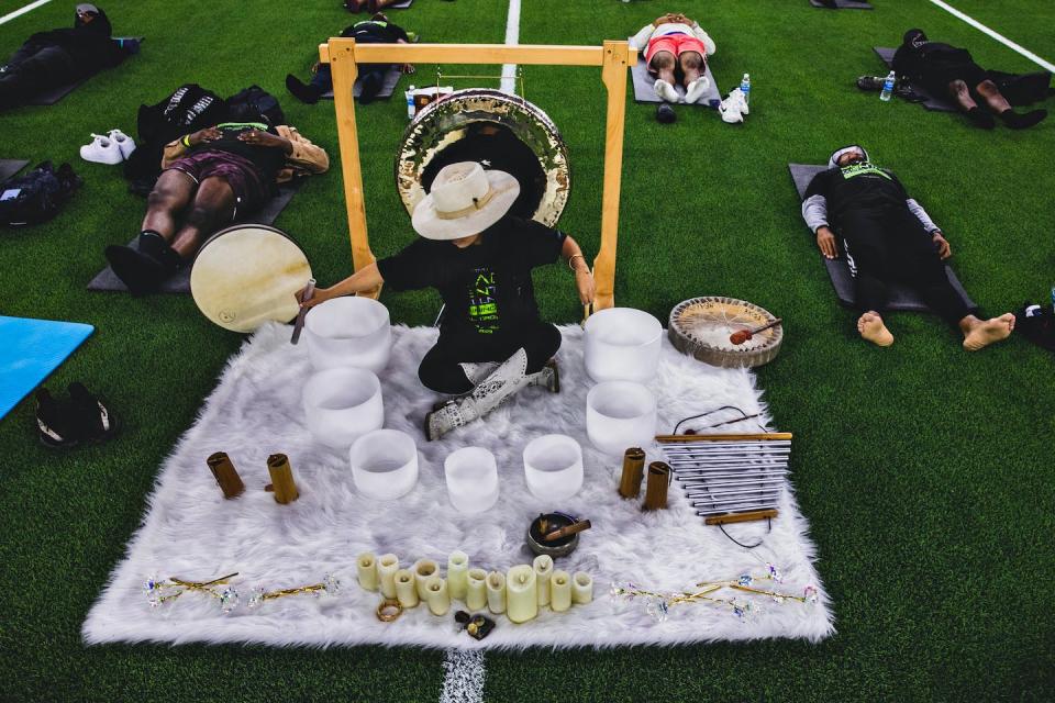 A sound bath healer plays her bowls at a mental wellness training camp for Black men in Inglewood, Calif. <a href="https://www.gettyimages.co.uk/detail/news-photo/inglewood-ca-a-sound-bath-healer-plays-her-bowls-at-news-photo/1259086092" rel="nofollow noopener" target="_blank" data-ylk="slk:Jason Armond/Los Angeles Times via Getty Images;elm:context_link;itc:0;sec:content-canvas" class="link ">Jason Armond/Los Angeles Times via Getty Images</a>