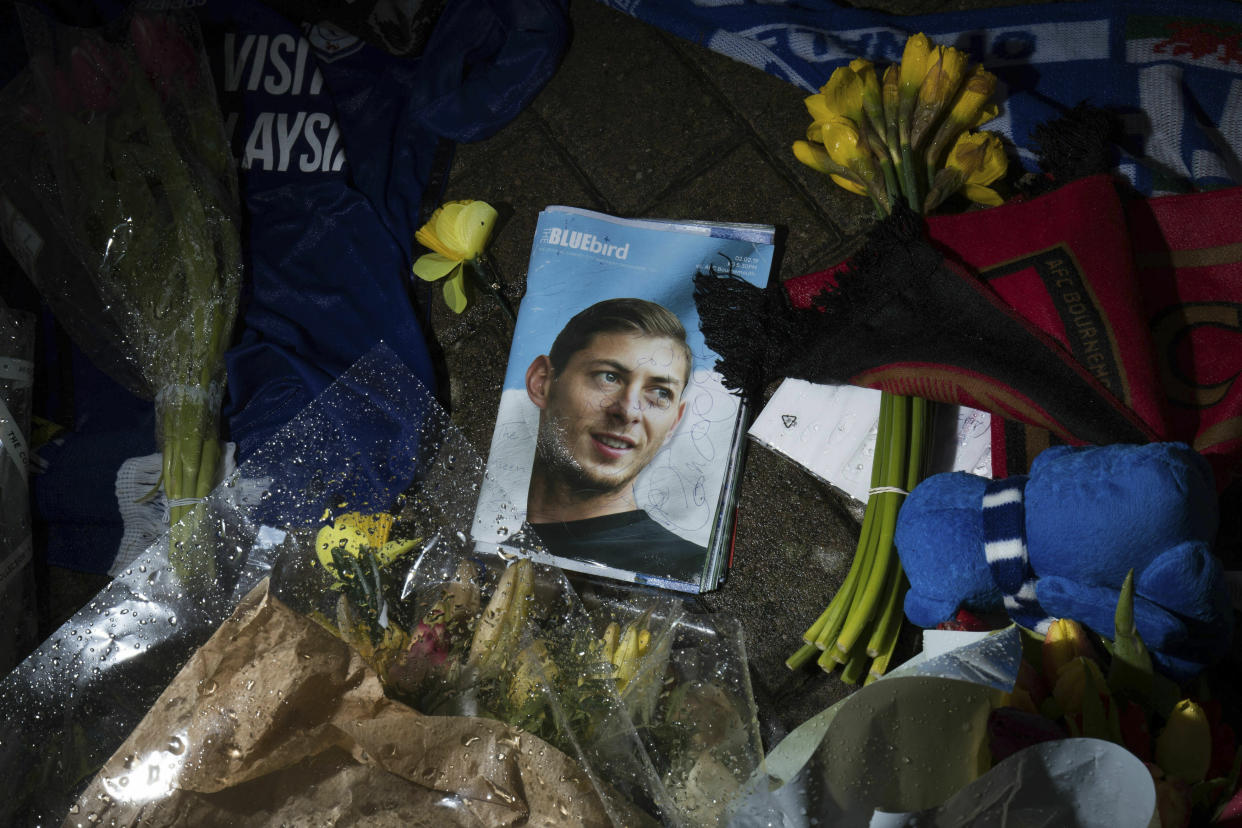 Tributes are placed outside the Cardiff City Stadium, Wales, for Emiliano Sala, Friday Feb. 8, 2019 (Aaron Chown/PA via AP)