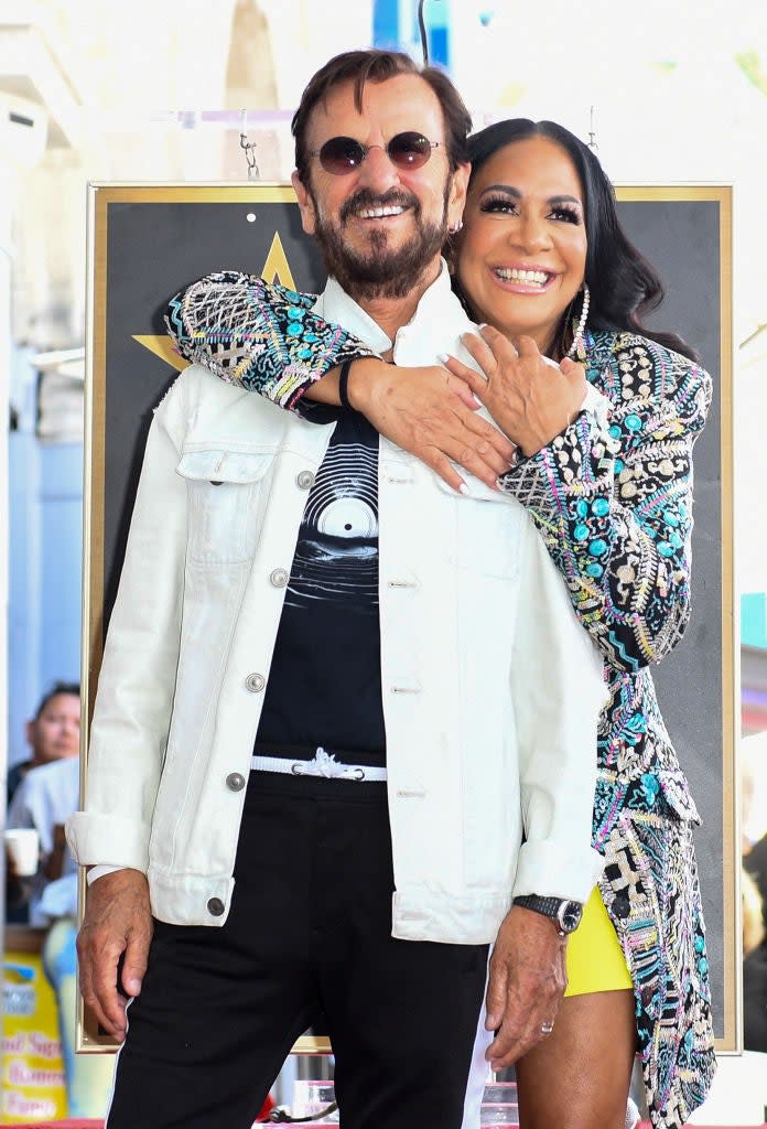 US percussionist Sheila E. (R) hugs British musician Ringo Starr during her Hollywood Walk of Fame Star ceremony in Hollywood, California, on July 12, 2023. Sheila E., who is receiving the 2,759th star on the Hollywood Walk of Fame, is being honored in the category of Recording. (Photo by VALERIE MACON / AFP)